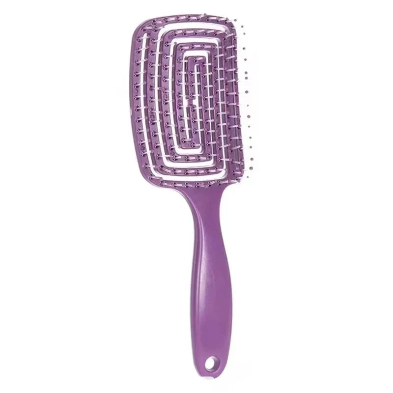 Flexible massage comb