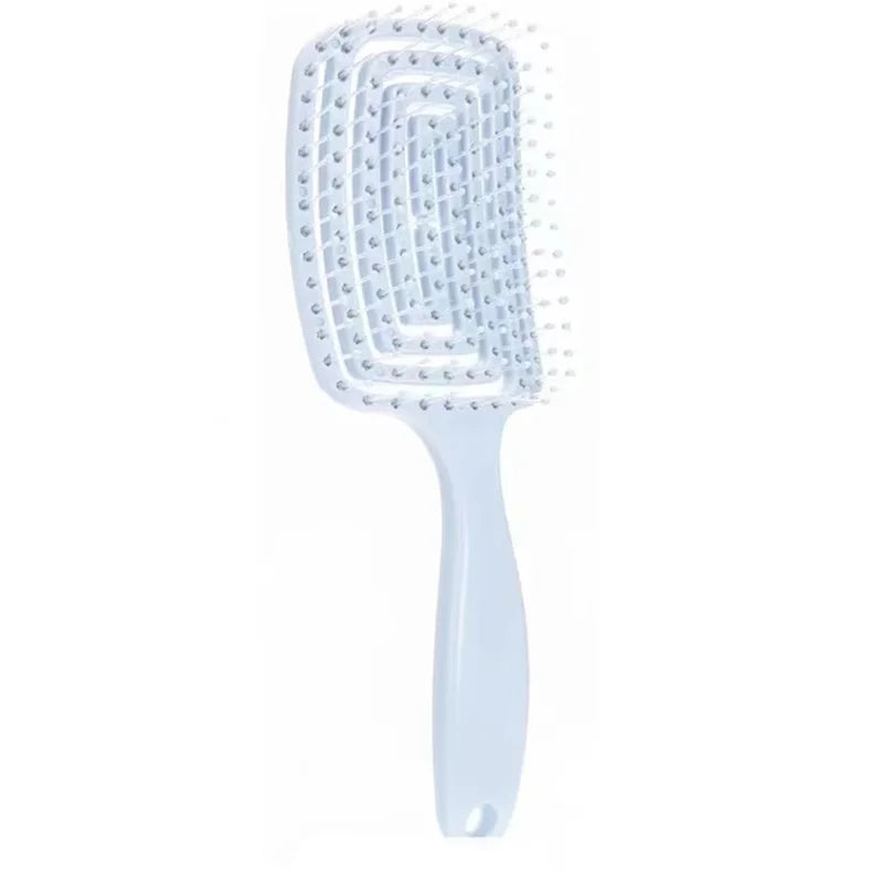 Flexible massage comb