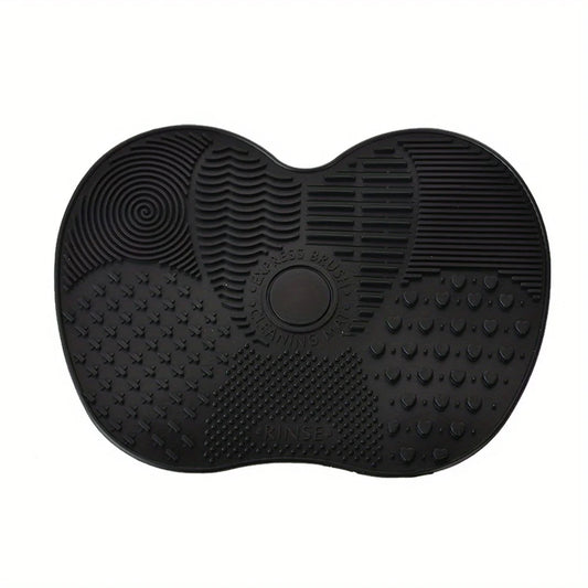 Apple-shaped makeup brush cleaning pad